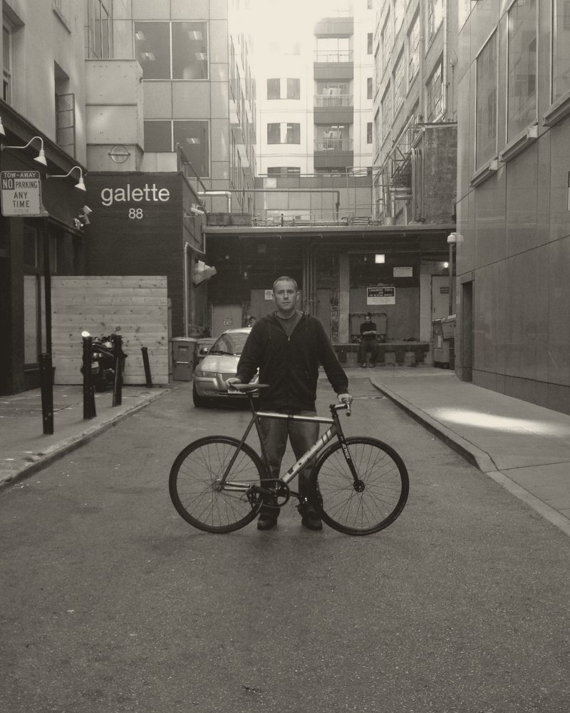 In a San Francisco alley with my bike, startup years